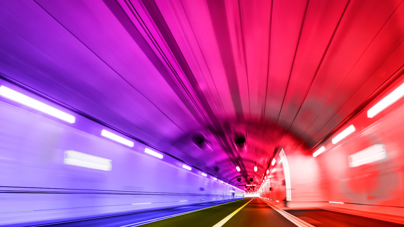 Light trails through a tunnel representing multi-gigabit throughput